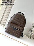 Louis Vuitton monogram backpack with black trim, front flap pocket and top handle