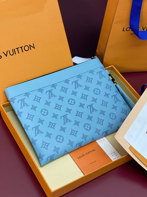 Louis Vuitton light blue small zip pouch with repeating monogram pattern