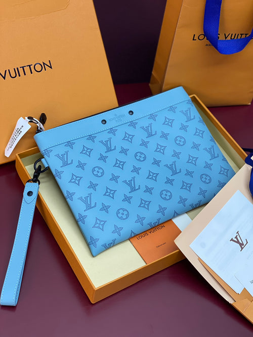Louis Vuitton small bag with light blue monogram pattern and wrist strap