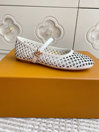 Louis Vuitton logo-pattern slip-on flats with white strap, angled side view
