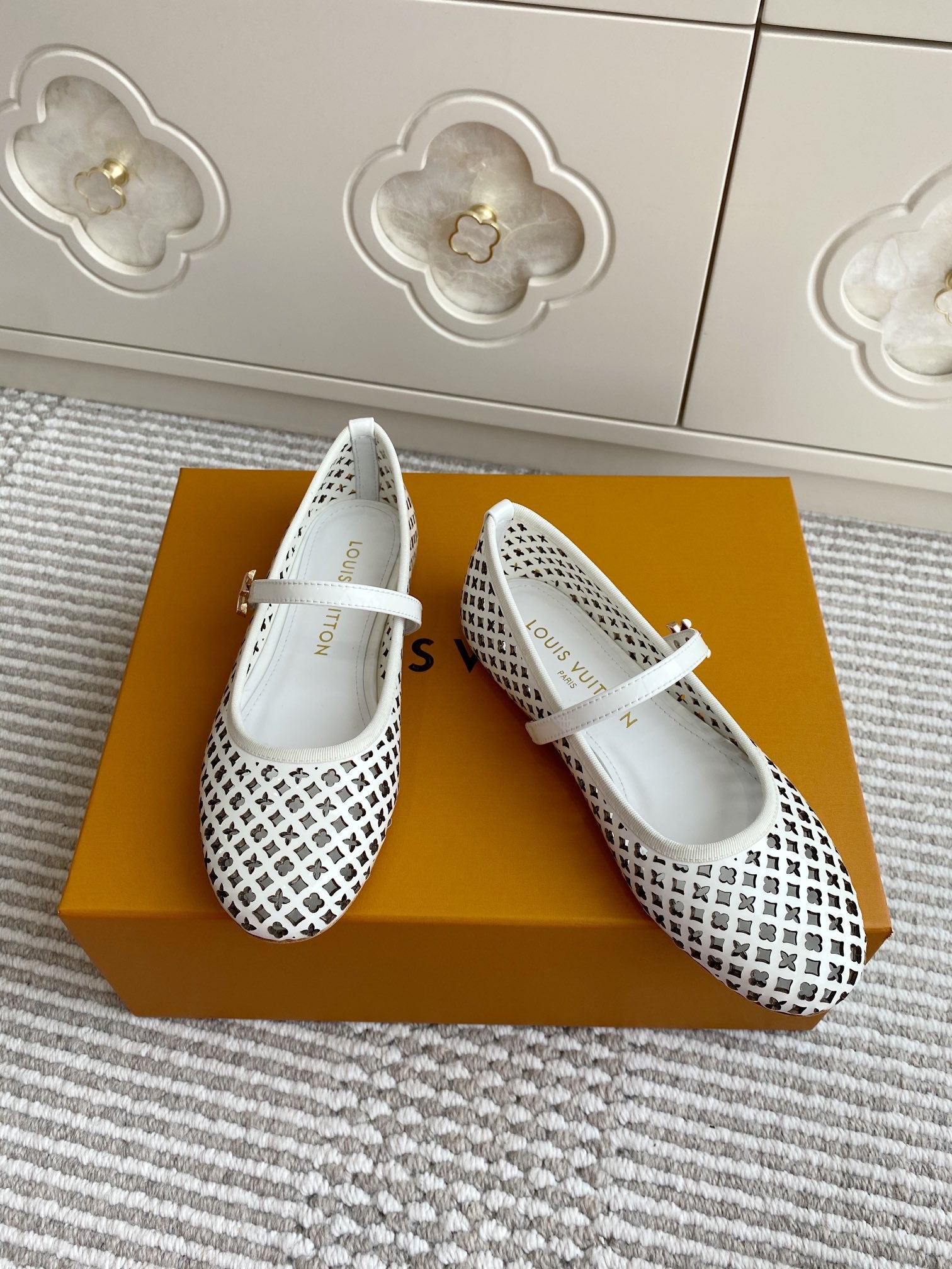 Louis Vuitton logo-pattern flats with white lace-up strap, front and side pair view
