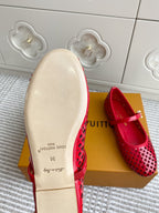 Women's Louis Vuitton red flats with cream sole and cutout lattice upper