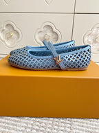 Blue perforated flats with light blue strap, woven lattice upper, and LV-style detail