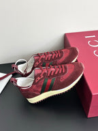 Ladies lace-up sneakers, dark red suede with green stripes and cream midsole