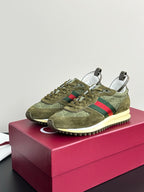 Olive Gucci ladies sneakers, angled front view with green laces, Web stripe, cream sole