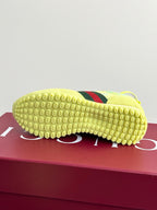 Women's Gucci sneaker outsole in lime yellow rubber with tread and green-red stripe panel