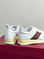 Gucci white sneakers back/heel view with green-red stripe and yellow sole