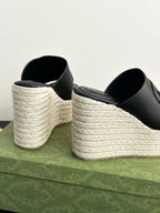 Gucci ladies black slide wedge sandals, rear view with textured espadrille heel