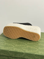 Gucci ladies black slide wedge sandal outsole with light textured platform base