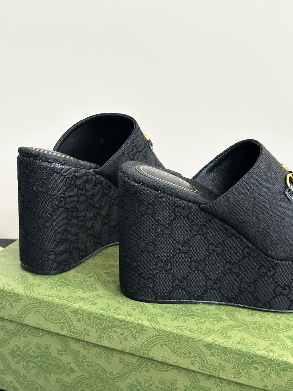 Gucci womens luxury shoes, dark platform mule with gold horsebit and side profile
