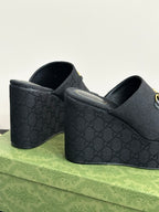 Gucci womens luxury shoes, dark platform mule with gold horsebit and side profile