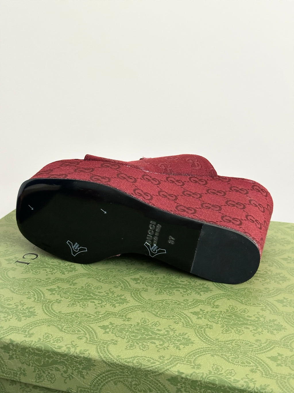 Burgundy Gucci wedge mules underside and tread, GG monogram fabric upper
