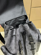 Monogram drawstring backpack with front pockets and black trim, dark gray