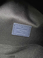 Blue fabric label patch on bag interior lining