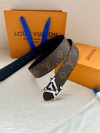 Monogram belt with gold-tone buckle and two strap ends on gift box set