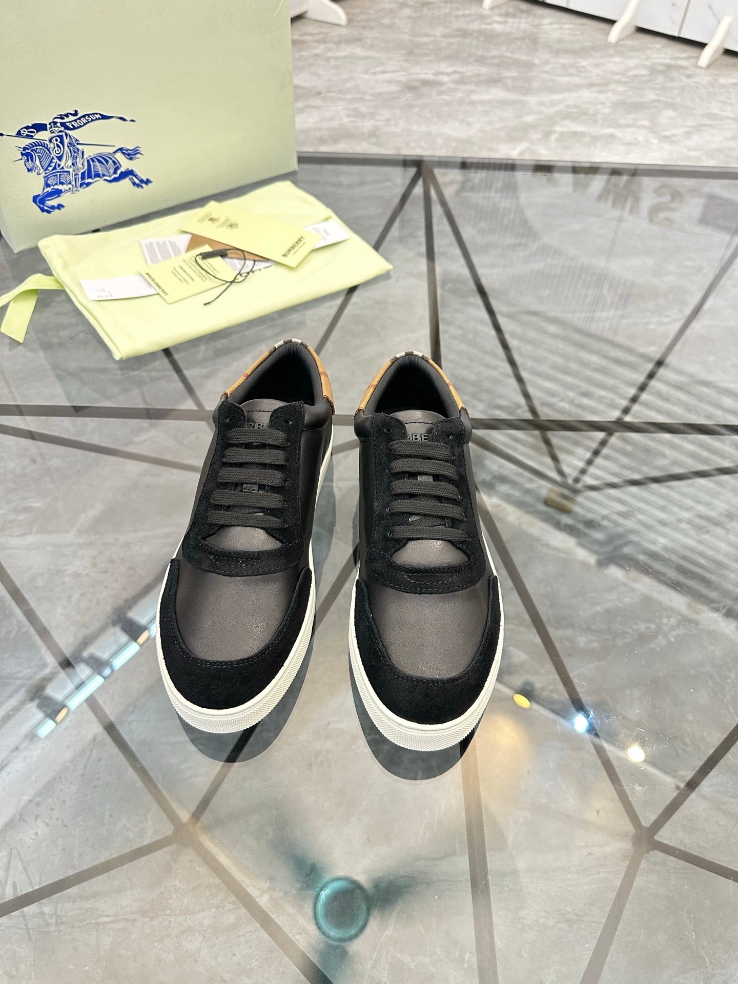 Burberry lace-up sneakers, black upper with white midsoles and textured toe caps