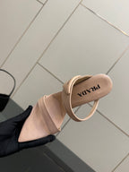 Prada women’s light beige heeled mule sole view, logo on insole