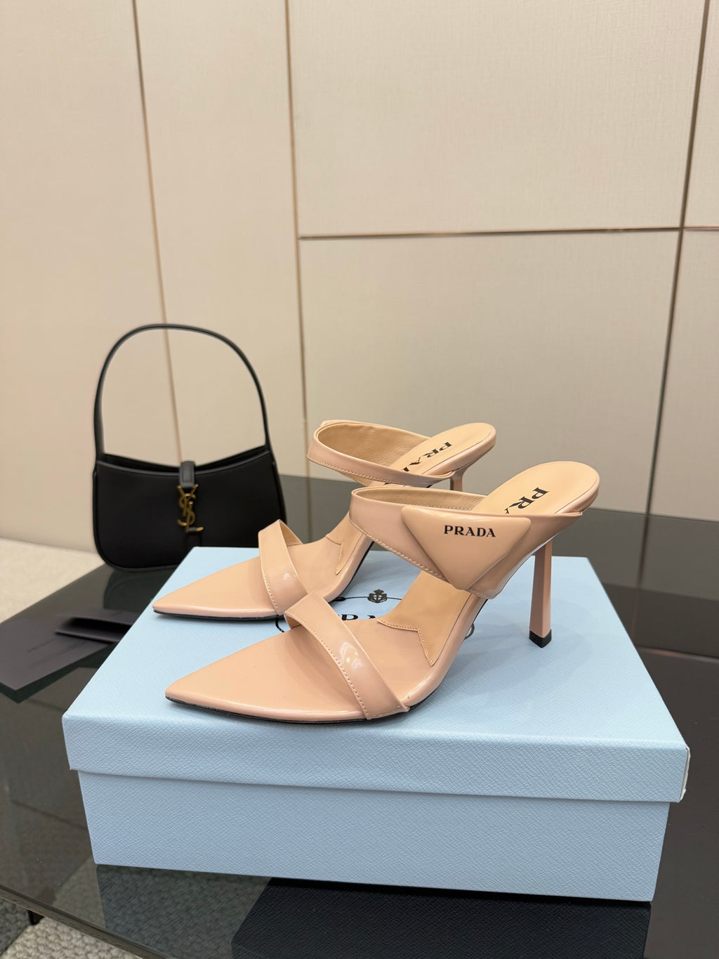 Prada women’s light beige heeled mules, cutout strap design, pair on box
