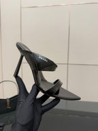 Prada black stiletto mule sandal with glossy crossover straps