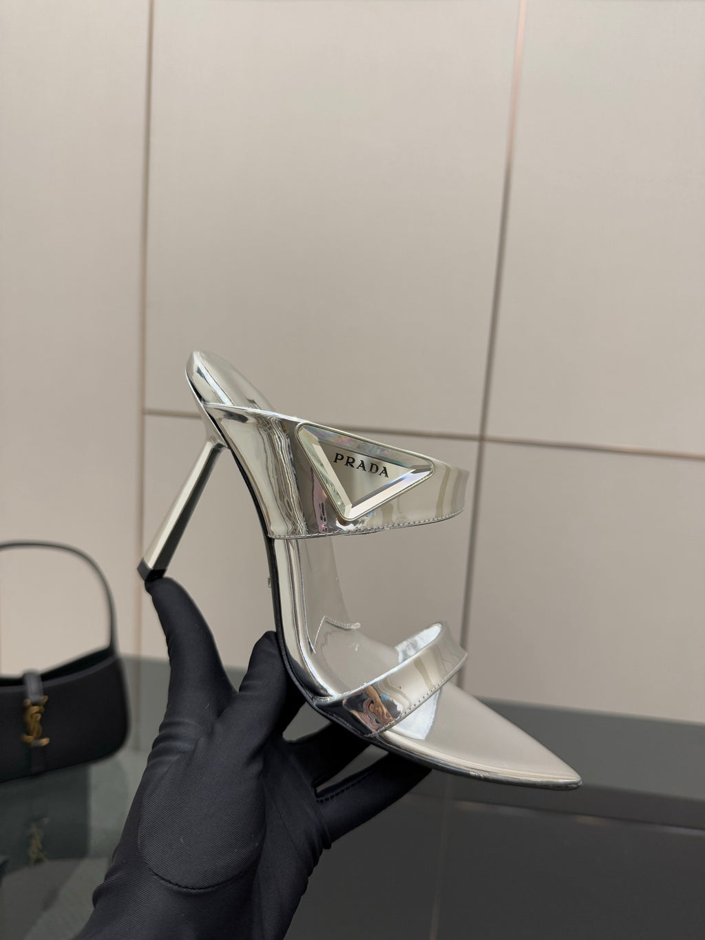 Women's silver high-heel sandal, pointed toe, mirrored strap across foot