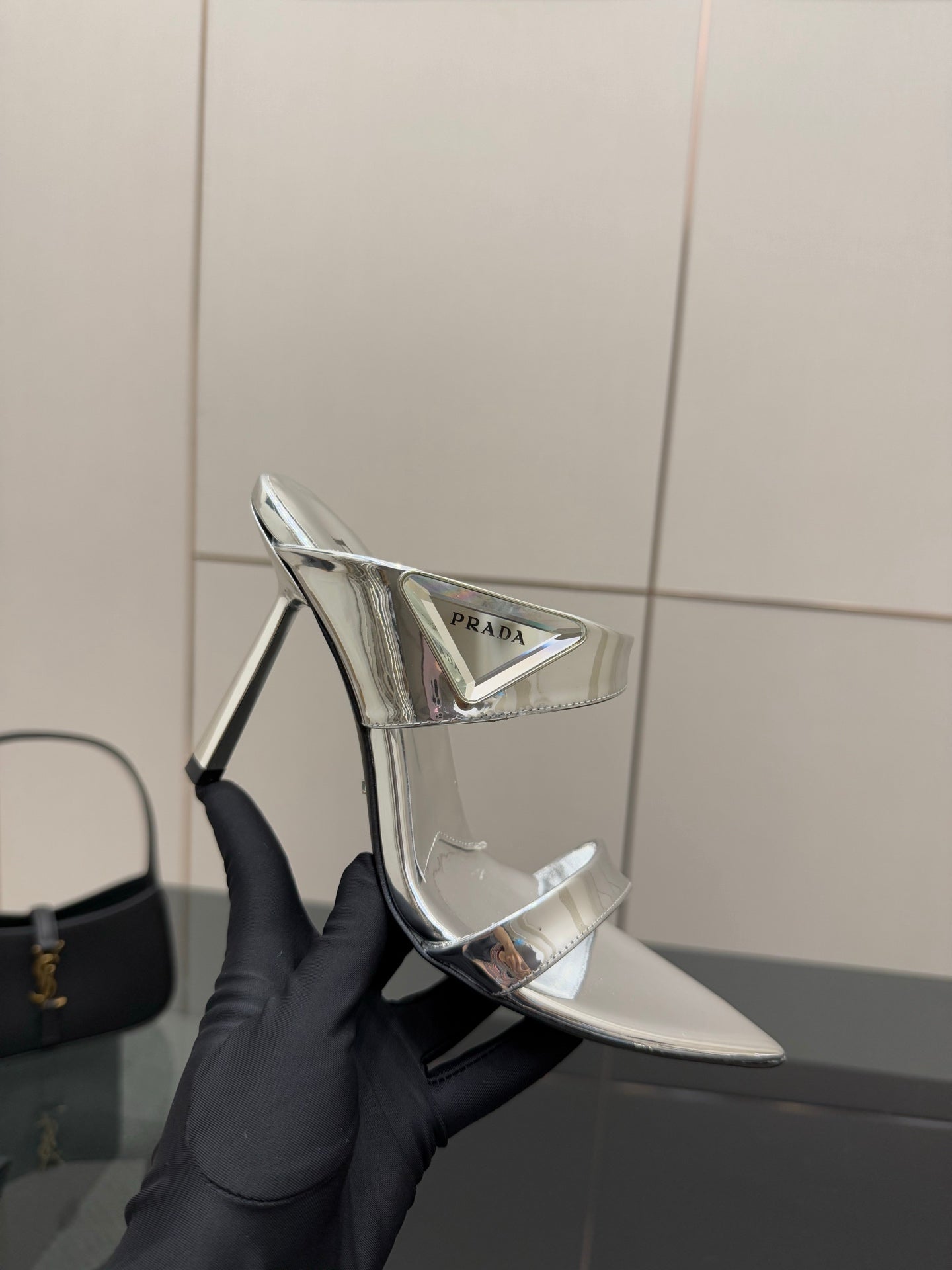 Women's silver high-heel sandal, pointed toe, mirrored strap across foot