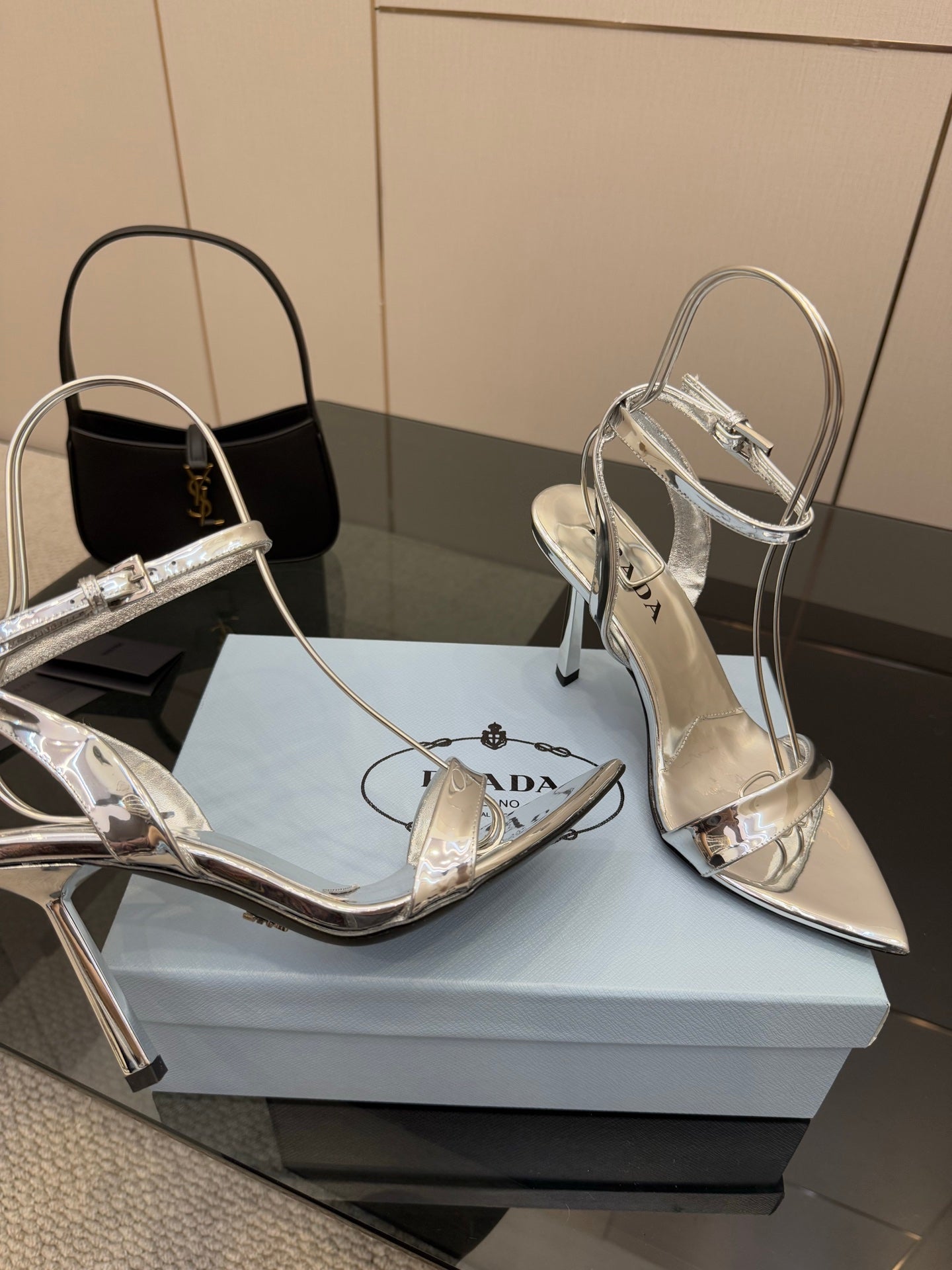 Prada women's metallic silver heeled sandals with ankle strap and pointed toe