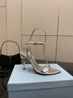 Prada women's metallic silver heeled sandal with single strap and stiletto heel