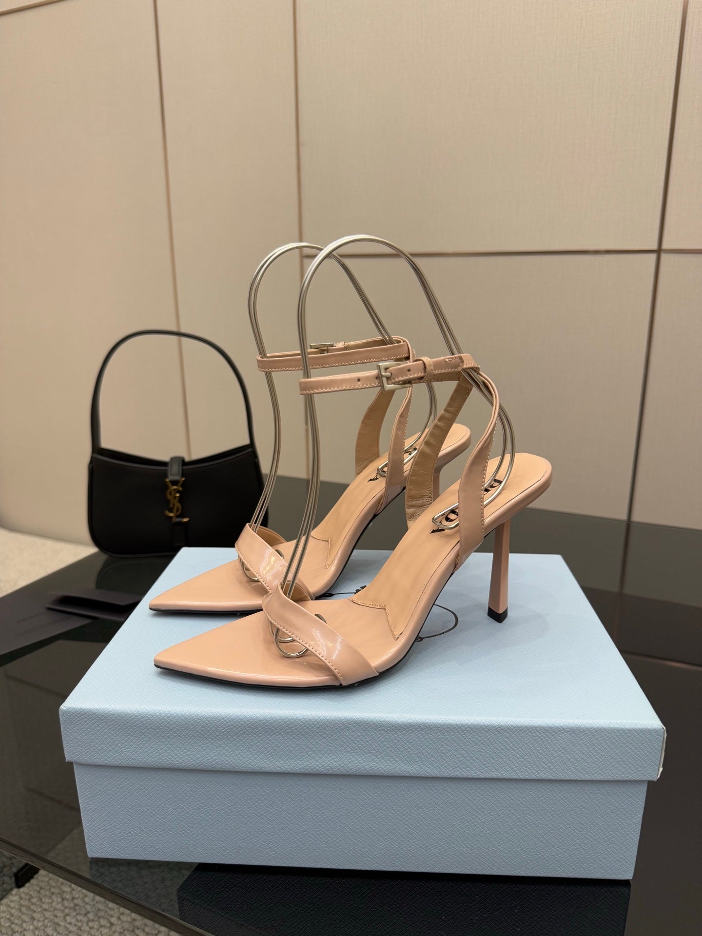 High-heel sandals in light nude with slingback strap and pointed toe on stiletto heels