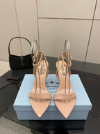 Prada high-heel sandals in light nude with pointed toe and ankle strap, stiletto heel