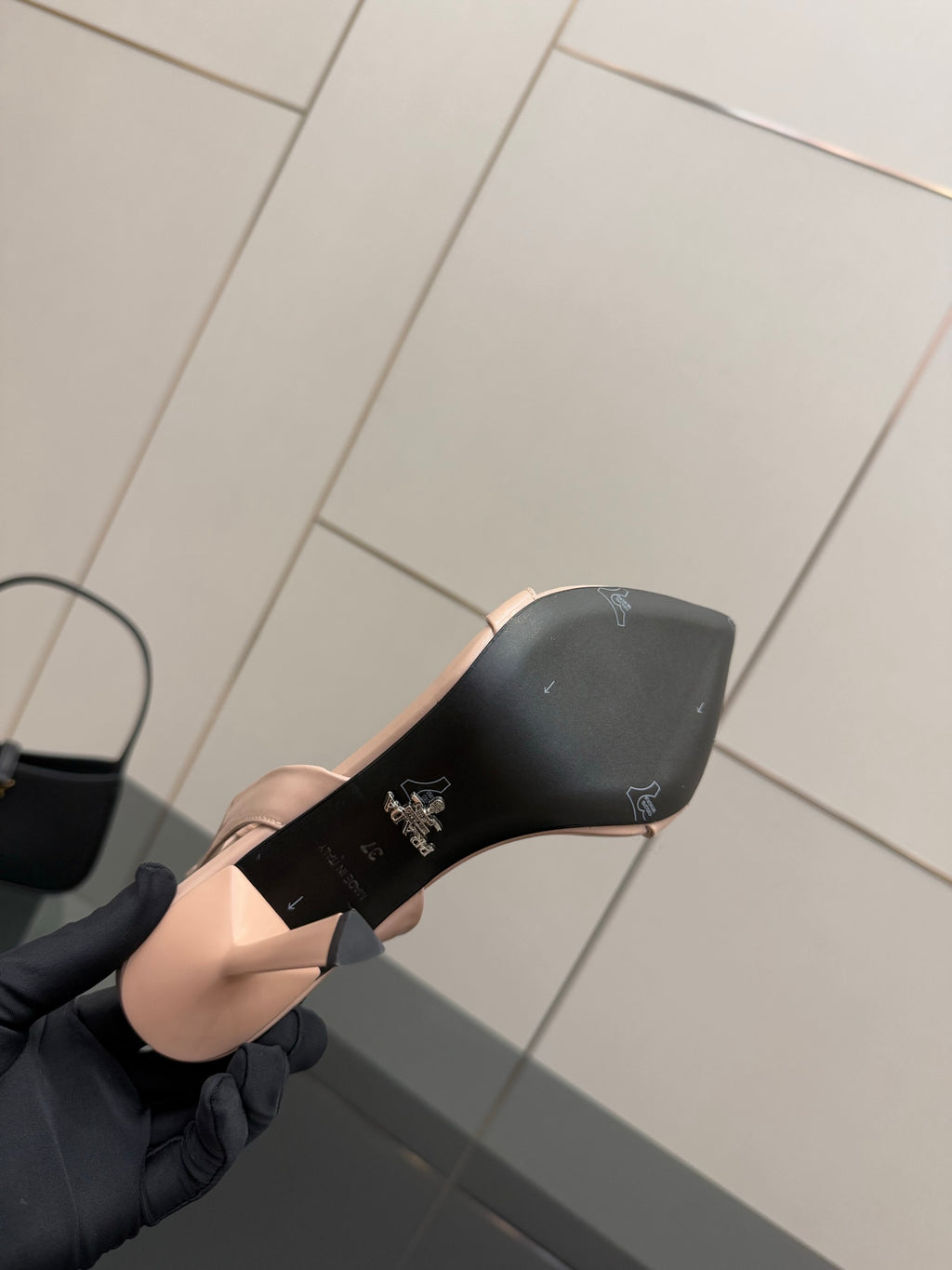 High-heel sandal sole in black with Prada logo and sculpted heel base
