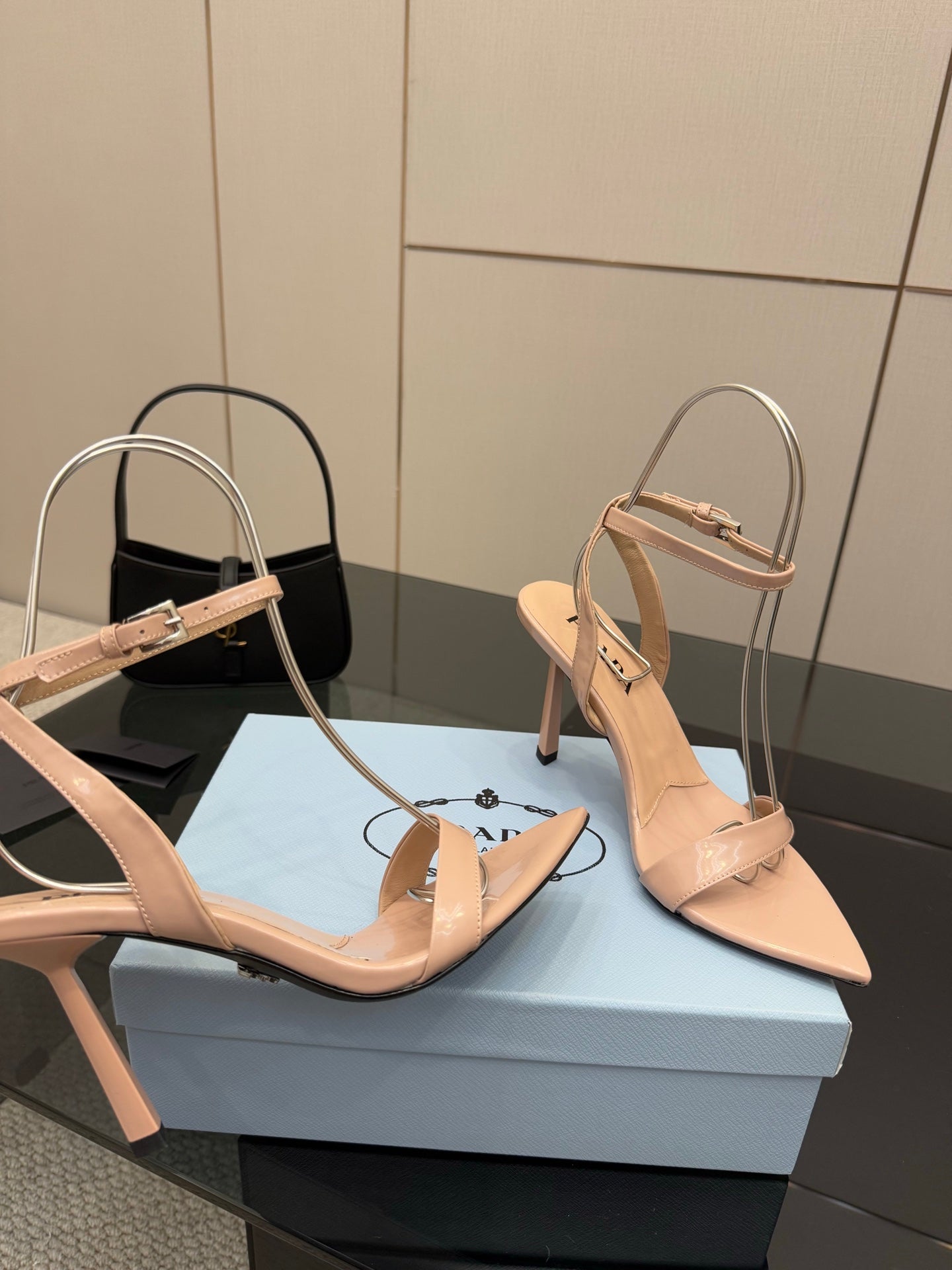 High-heel sandals with light nude pointed toe, cross ankle straps, slim stiletto heels