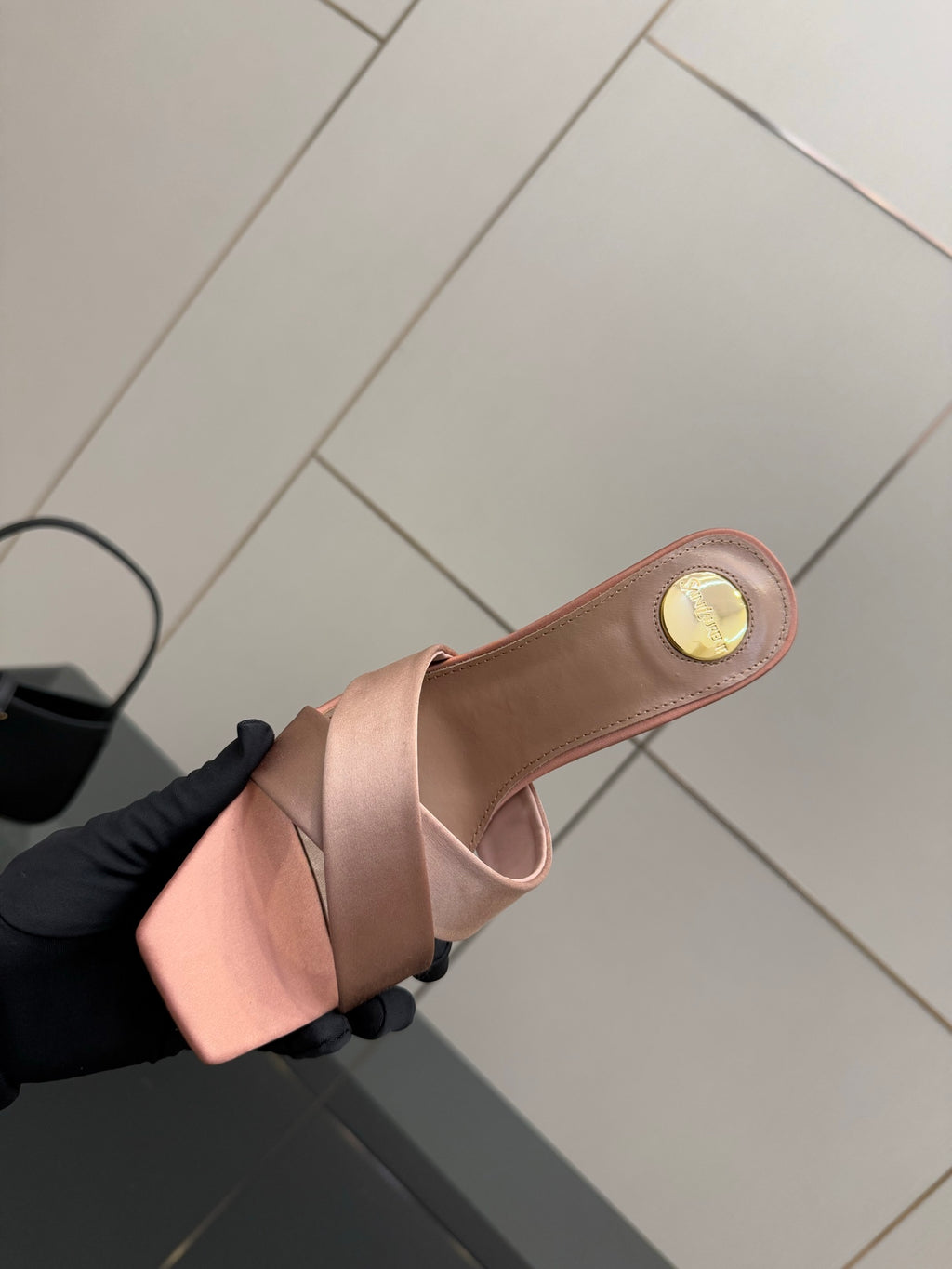 Pink YSL logo slide sandals, top view of open toe mule with low heel