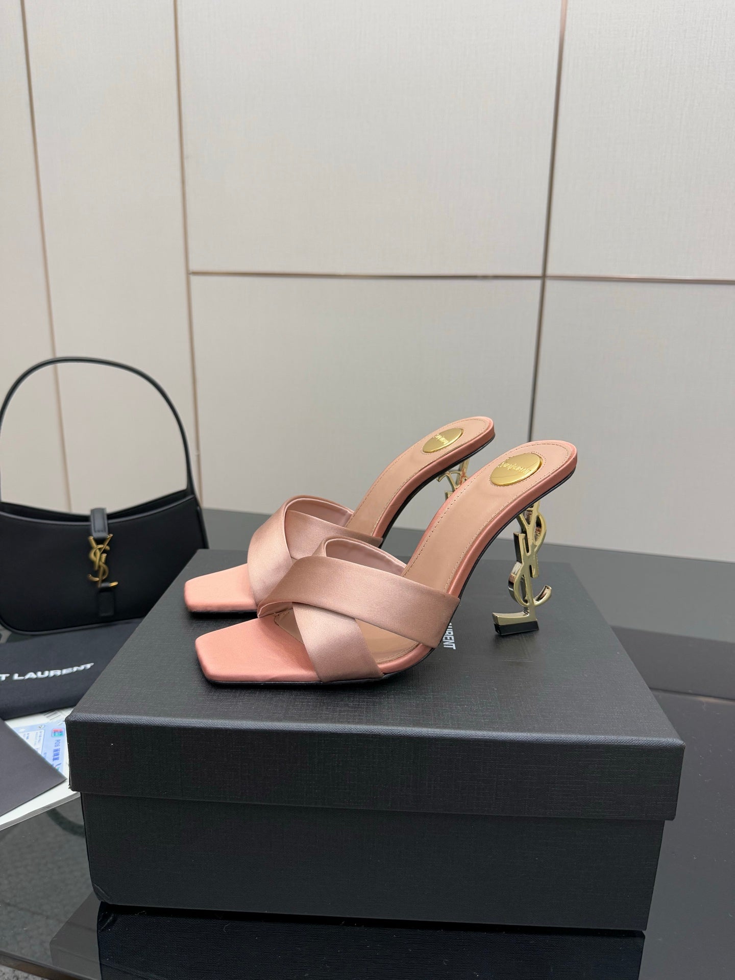 Pink YSL logo mule sandals, open toe with wide crossover straps and low heel