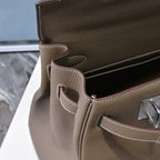 Hermes handbag taupe leather, side gusset detail with stitched handle and pocket