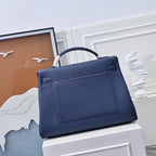 Hermes bag in dark blue leather with front rectangular pocket panel and handle