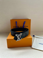 Louis Vuitton belt with dark monogram canvas and silver LV center buckle