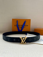 Louis Vuitton monogram belt with gold-tone LV buckle, dark canvas strap