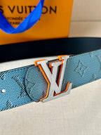 Light blue monogram belt with large LV logo buckle and metal orange trim