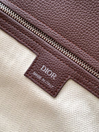 Dior men's brown leather bag Made in Italy label near zipper and pull tab