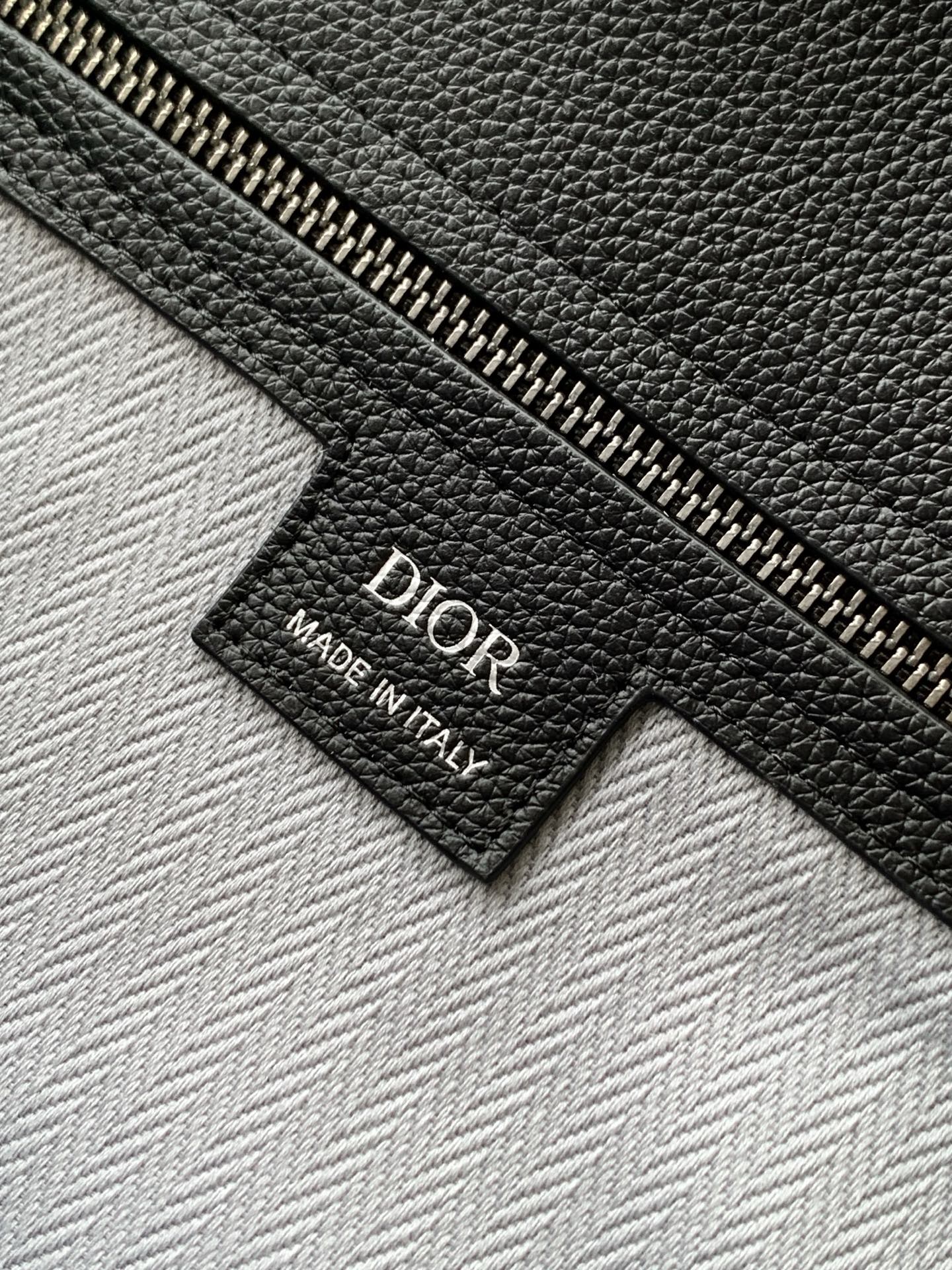 Black leather interior label reading Dior and Made in Italy on lining