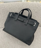 Dior structured tote bag with top handles and front logo