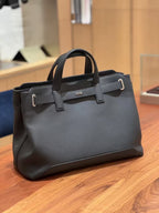 Dior structured tote with top handles and front logo, three-quarter view