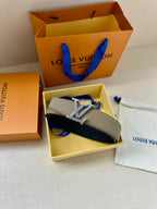 Louis Vuitton belt in box: beige and dark blue straps with gold LV buckle detail