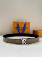 Louis Vuitton belt with dark blue strap, beige leather, and gold LV buckle