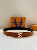 Louis Vuitton leather belt, brown strap with silver LV logo buckle.