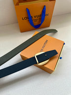 Dark green leather belt with oval metal buckle, plus matching strap accessory.