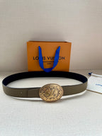 Louis Vuitton belt with beige strap and gold-toned oval logo buckle