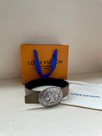 Louis Vuitton belt with beige strap and silver-toned oval logo buckle