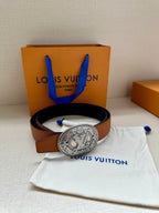 Brown leather belt with silver-tone oval logo buckle and matching gift set