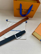 Brown leather belt with silver-tone oval logo buckle and navy strap on pouch